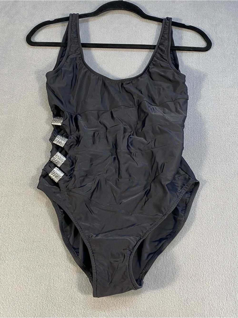 Venus black one piece swimsuit with side cuts silver embellishments, size 8